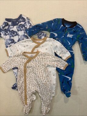 Lot of 4 Footies Sz 3m.  Nike, Burt's Bees - GUC. UU